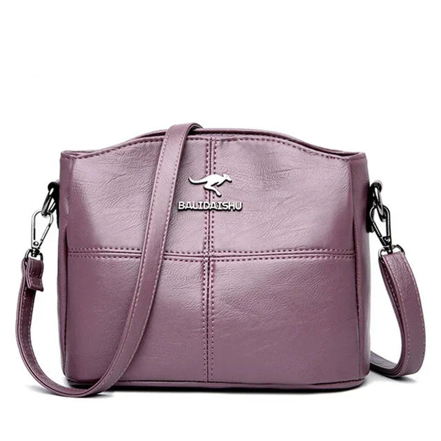 Elegant embroidered leather tote and shoulder bag for women